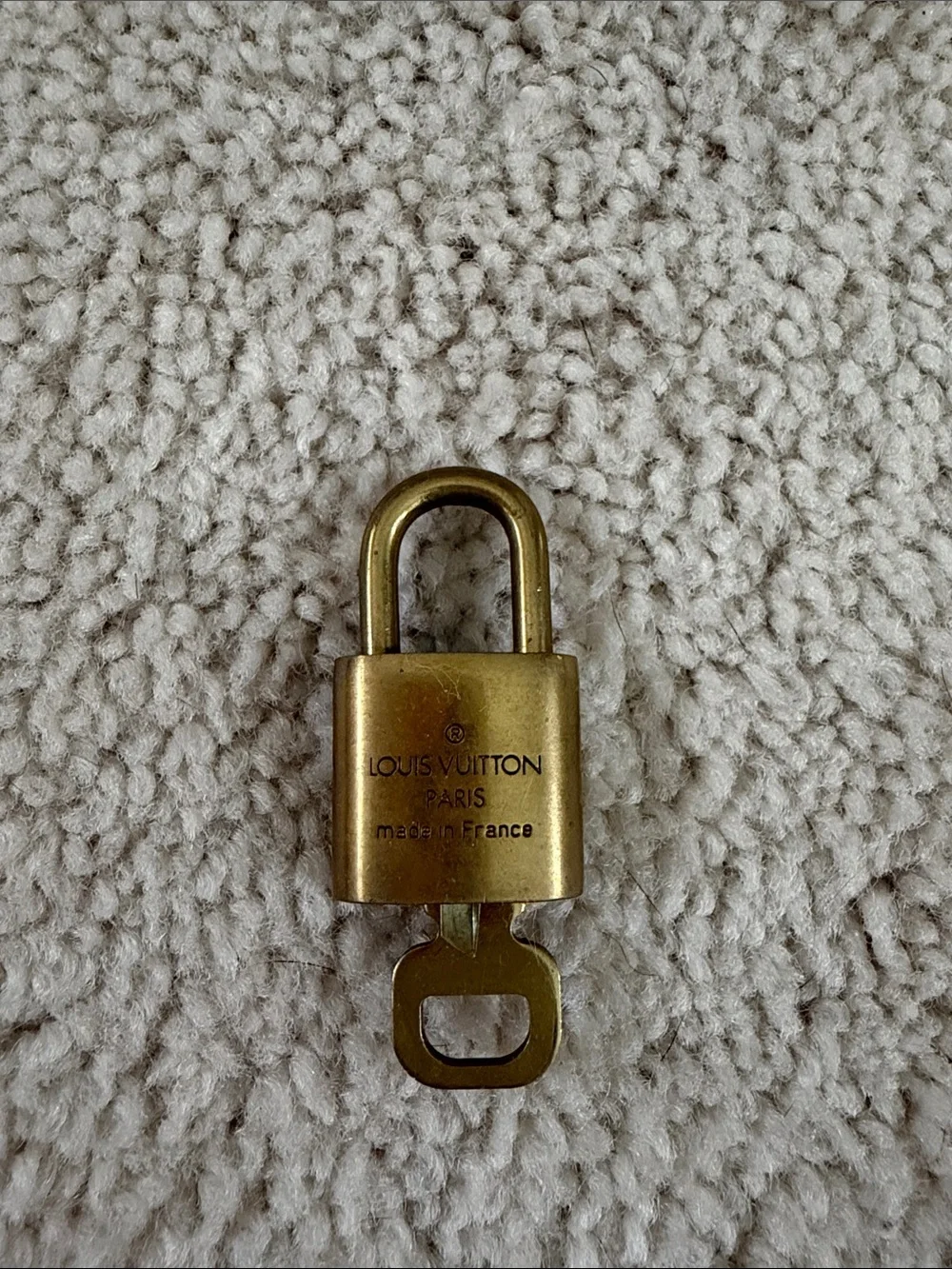 Louis Vuitton Gold Lock